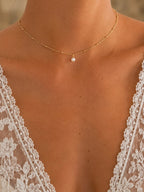 Collier de dos or laminé gold filled Gilda, chaîne maille gourmette perlée