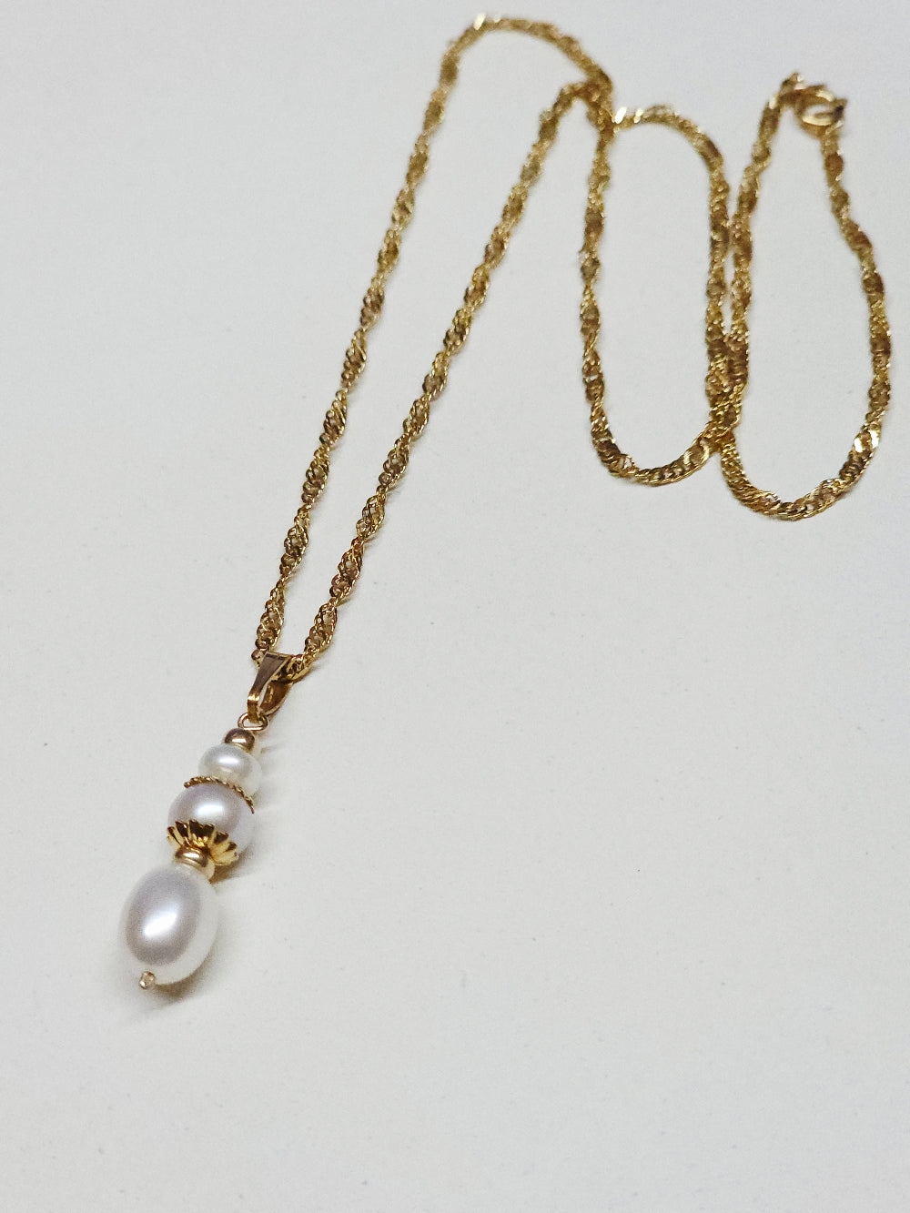 Collier pendentif goutte totem Manille