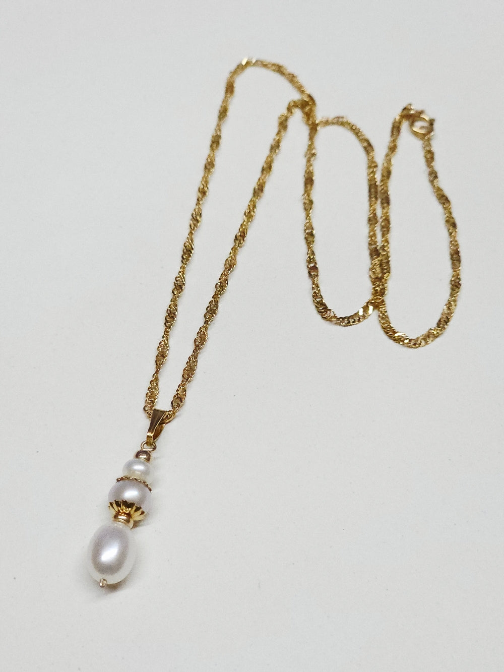Collier pendentif goutte totem Manille